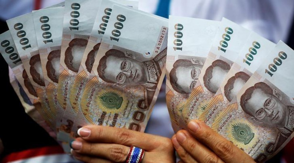 Thai central bank steps in to curb baht price’s surge